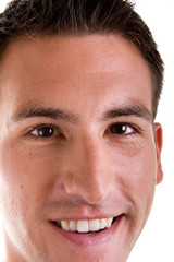 Obraz premium A young guy with a great smile closeup