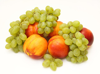 Bright, ripe fruit - grapes and nectarines. Object over white