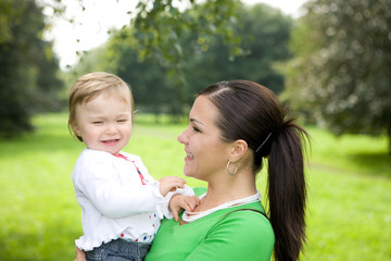 happy family on green meadow