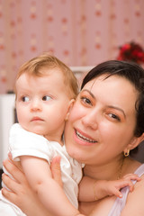 Beautiful portrait of a mother and her baby girl.