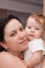 Beautiful portrait of a mother and her baby girl.