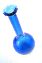 Blue glas vase on white background