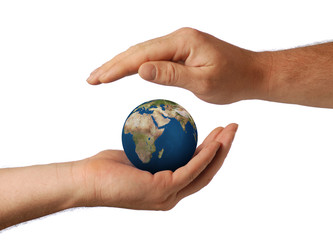 Planet the earth in human hands