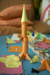 Children's creativity. A rocket from a paper