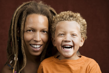 Pretty African American Woman and Her Son - Powered by Adobe