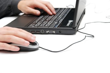 Using a laptop isolated on white