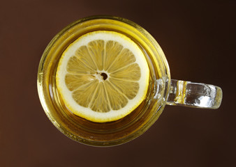 cup of ice tea with piece of lemon