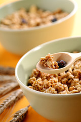 bowls full of musli with milk, healthy breakfast.