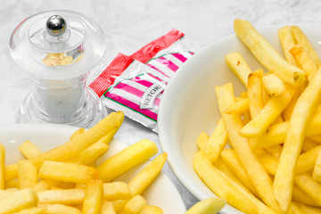French fries with salt and tomato ketchup