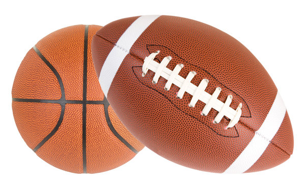 Close-up of a basketball and a football