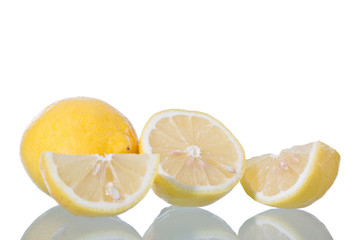 Sliced lemon, isolated on white background with reflection