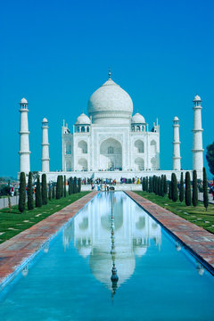 World wonder Taj Mahal in soft daily light with blue sky
