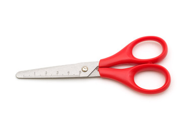 red scissors on white background