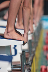 Swimmers on starting blocks