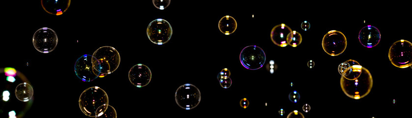Color soap bubbles on black