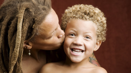 African American mother and biracial son - Powered by Adobe