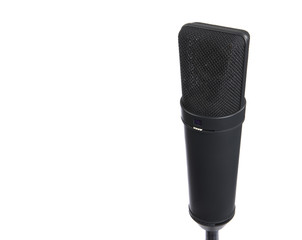 Black microphone isolated on white