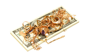 Gold ornaments and dollars isolated on a white background