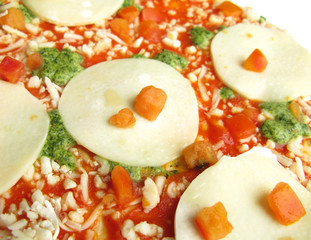 Pizza with mozzarella slices prepared for baking in oven