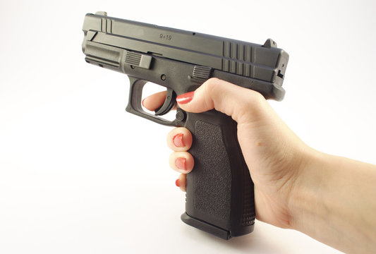 pistol in the woman hand