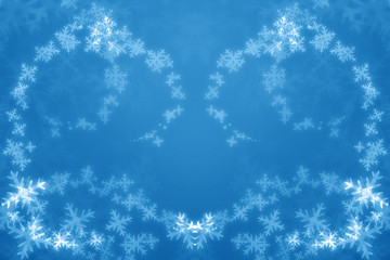 white snow flakes on a blue background