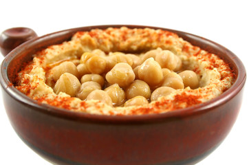 Earthenware bowl with delicious hommus and chickpeas