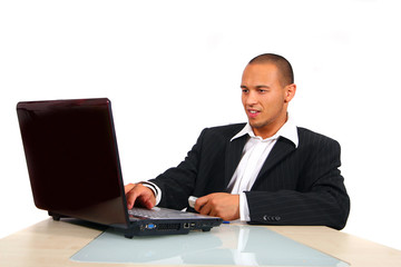 Young Business Man Working On His Laptop