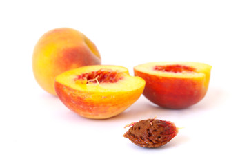 Ripe peach isolated on a white background