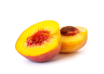 Ripe peach isolated on a white background