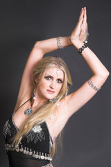 Beautiful Blond Belly Dancer with traditional jewelery