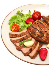 served roasted beef meat steak on color dish