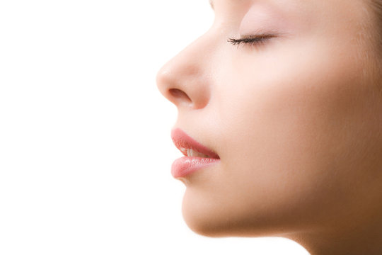 Profile of feminine face with closed eyes and make-up
