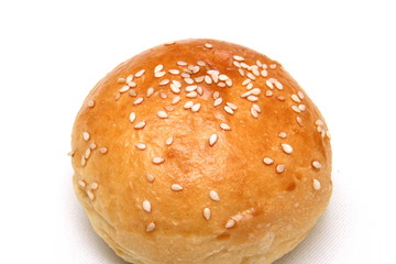 Round bread roll on white background