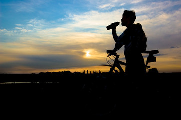 silhouette of biker