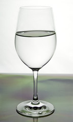 the refraction of the scene in goblet with water.