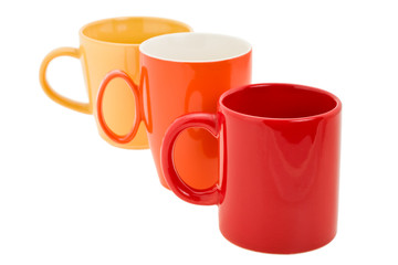 bright ceramic mugs expressed on white background