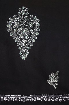 Classic Indian needlework with sequins on black cloth