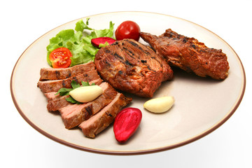 roasted meat steak on color dish
