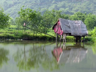 Fotobehang Baracca sul fiume Li © xiaoma