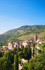 Fototapeta na wymiar Traditional Toscana Italy landscape. Small city and mountains.