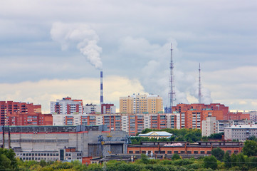 Urban scene with energy factory, construction factory and houses