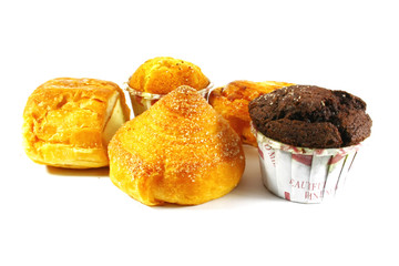 Assorted Pastries and Cakes On a White Surface Background