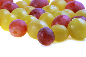bunch of fresh grapes with leaf isolated on white