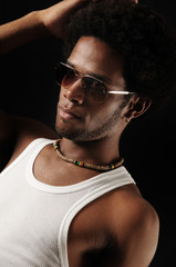 Portrait of young trendy latino fashion male isolated