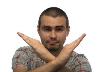 The man shows his crossed hands isolated