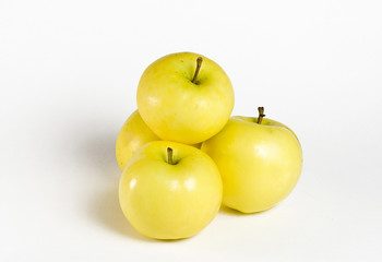 fresh yellow apples on the white background