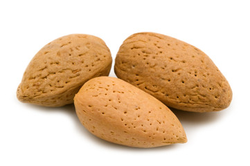 Almonds on white background