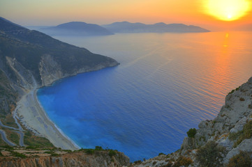 Sunset over the beautiful beach of Myrtos, Kefalonia, Greece