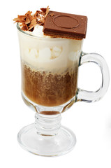 Coffee cocktail with ice-cream and chocolate in glass