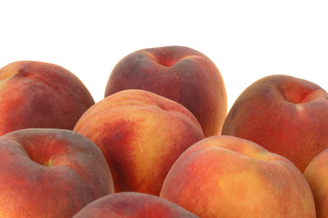 Fresh peaches on white background